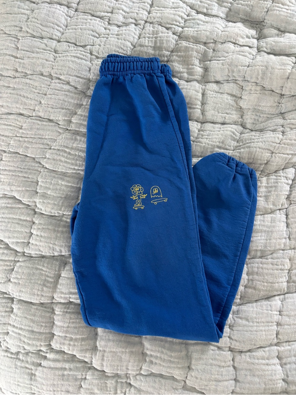 LONELY GHOST Blue Sweatpants with Small Yellow Graphic